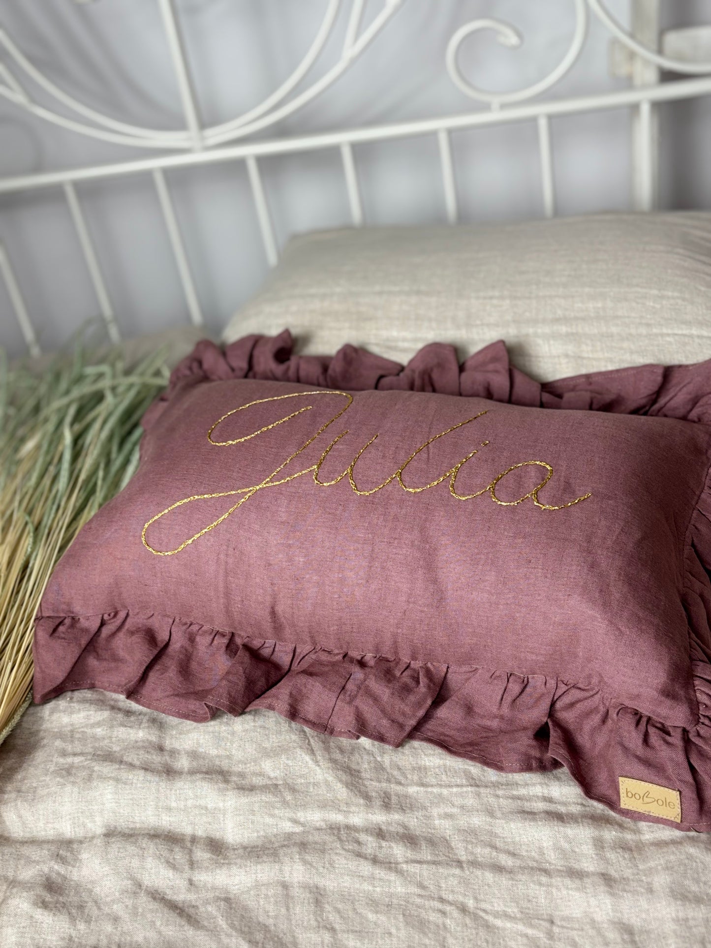 Linen pillow with embroidered name