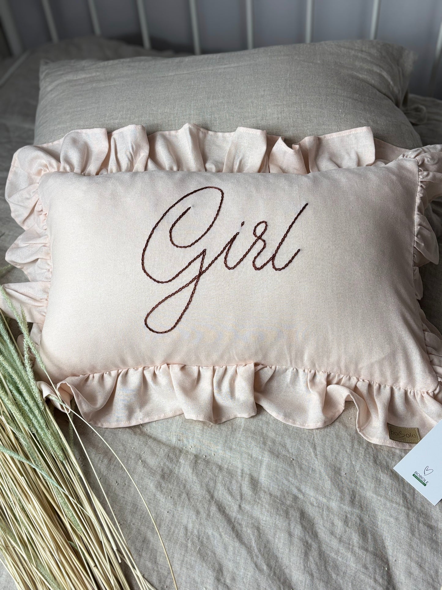 Linen pillow with embroidered name